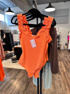 Bright orange bodysuit